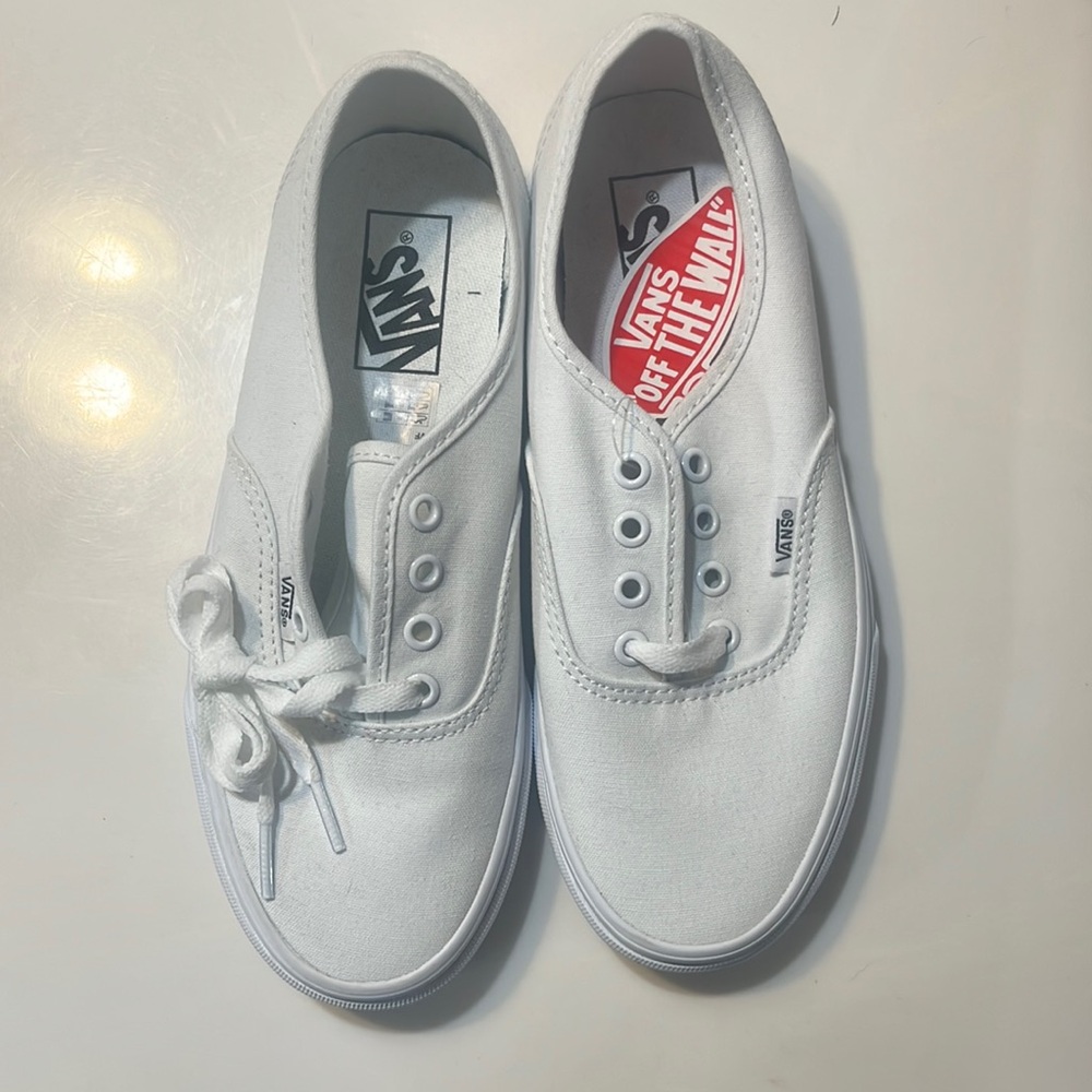 Canvas white vans